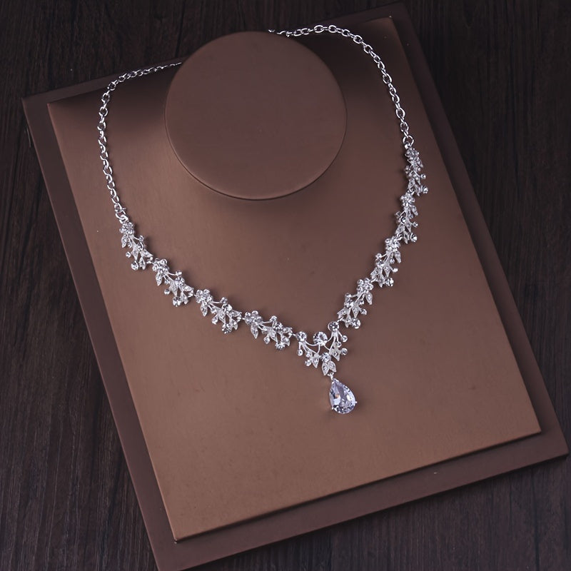 Céleste zircon bridal necklace on a brown jewellery display