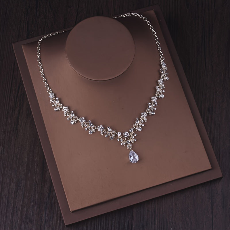 Céleste bridal necklace with clustered zirconia leaves and a teardrop pendant