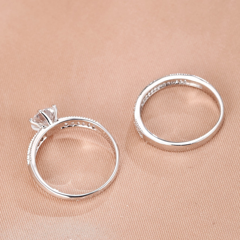 Éternité ring set showing the solitaire setting and slim band from the side