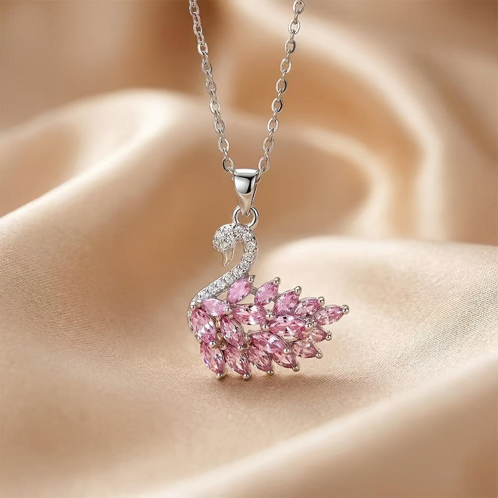 Cygne swan pendant with marquise-cut pink stones on a silver-tone chain