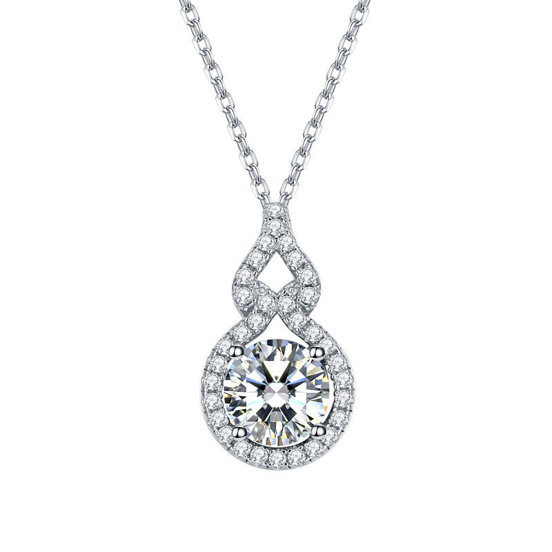 Éclat solitaire pendant: round zircon in a pavé halo on a silver-tone chain