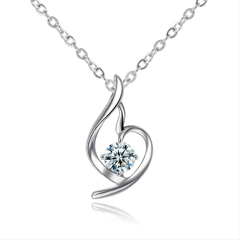 Lumière heart pendant with a clear crystal on a silver-tone chain