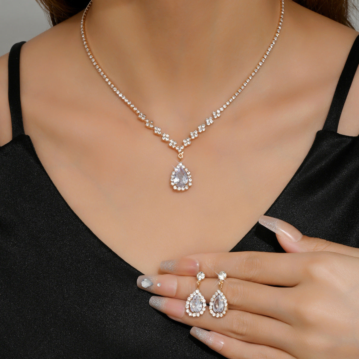 Soirée Drop Set in clear crystal worn with matching earrings