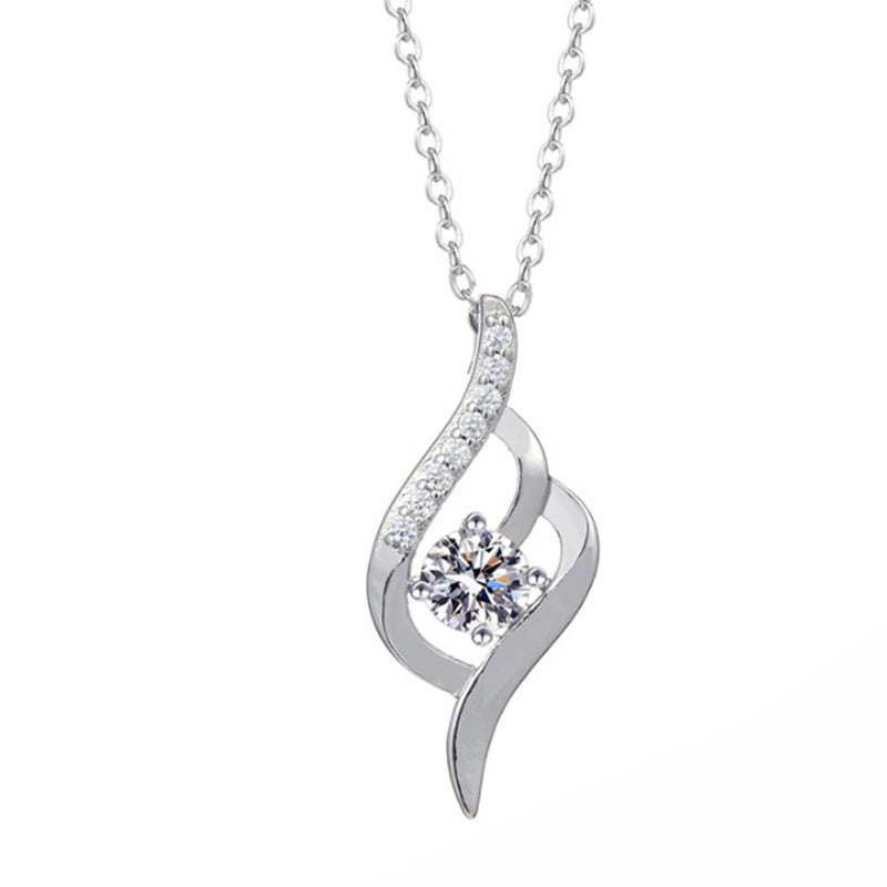 Twist of Heart pendant: swirl heart with a clear zircon and pavé accents